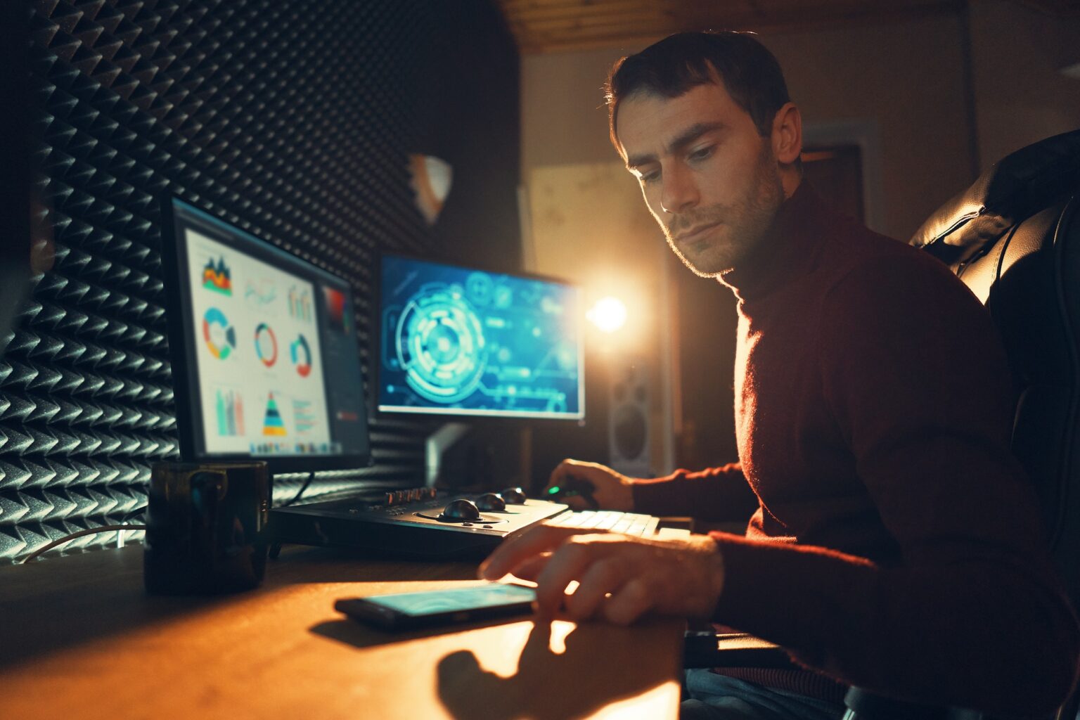 Male Videographer Edits and Cuts Footage and Sound on His Personal Computer
